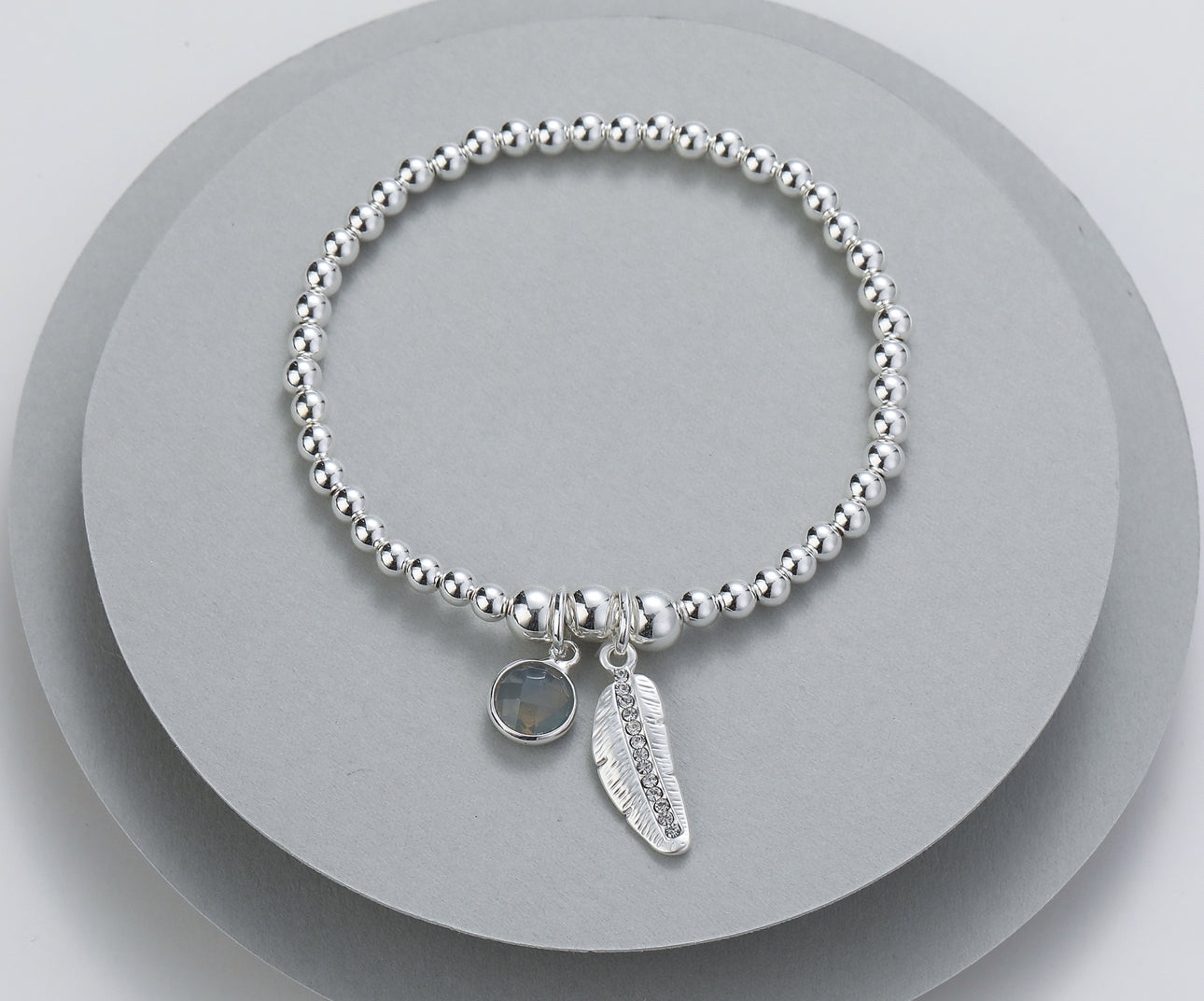 Feather and Charm Bracelet