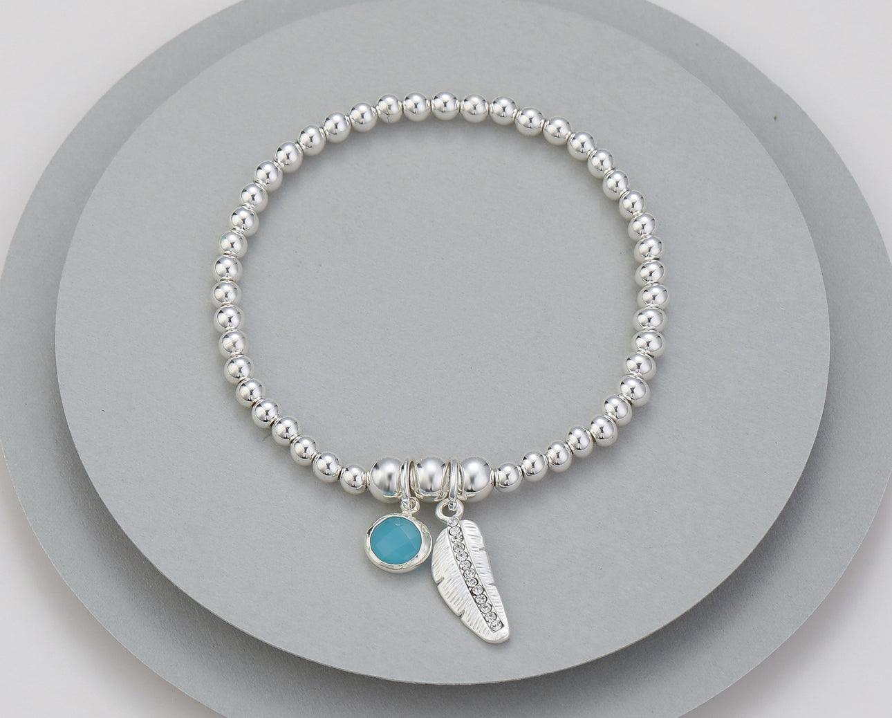 Feather and Charm Bracelet