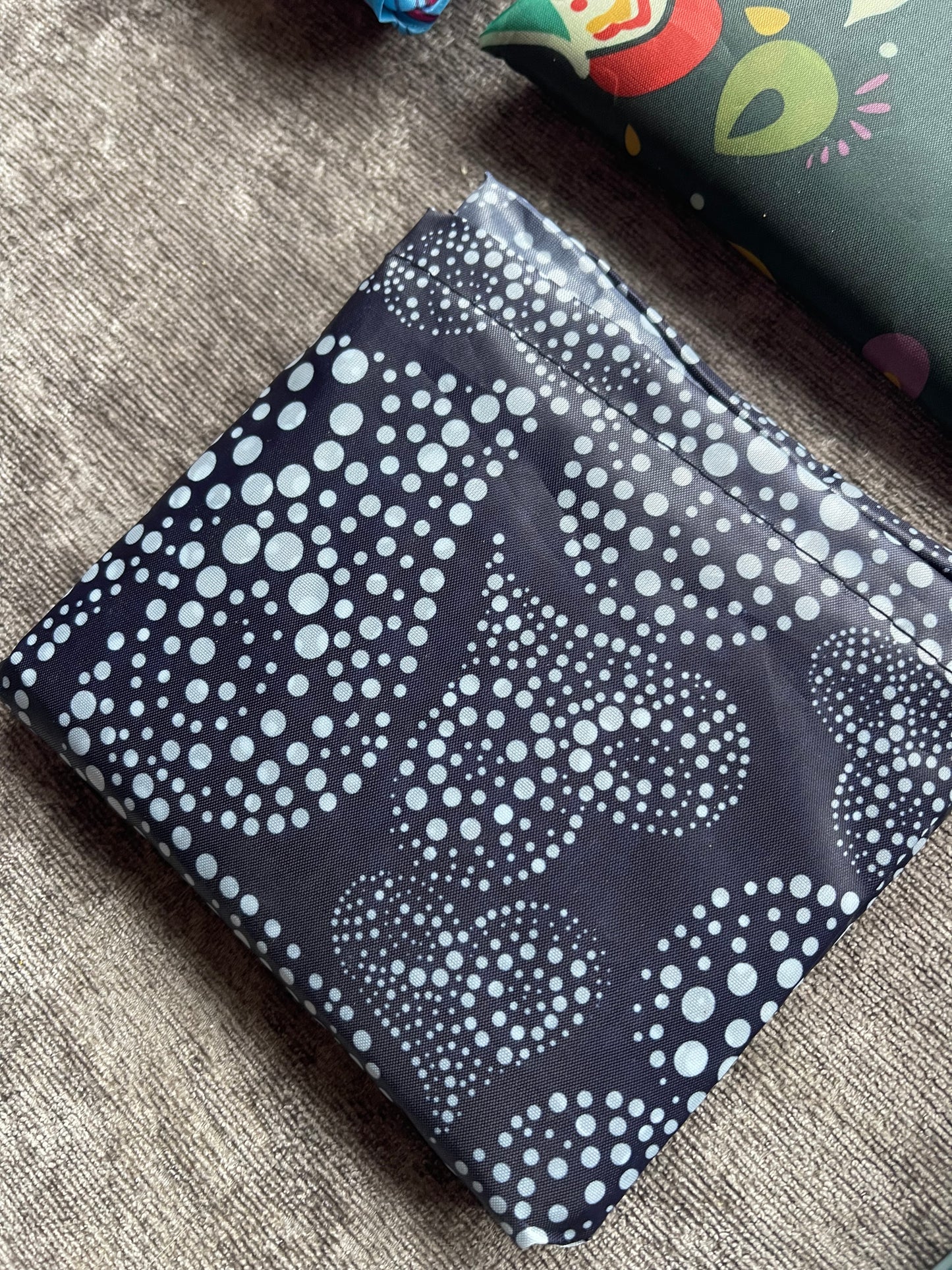 Reusable folding shopping bags