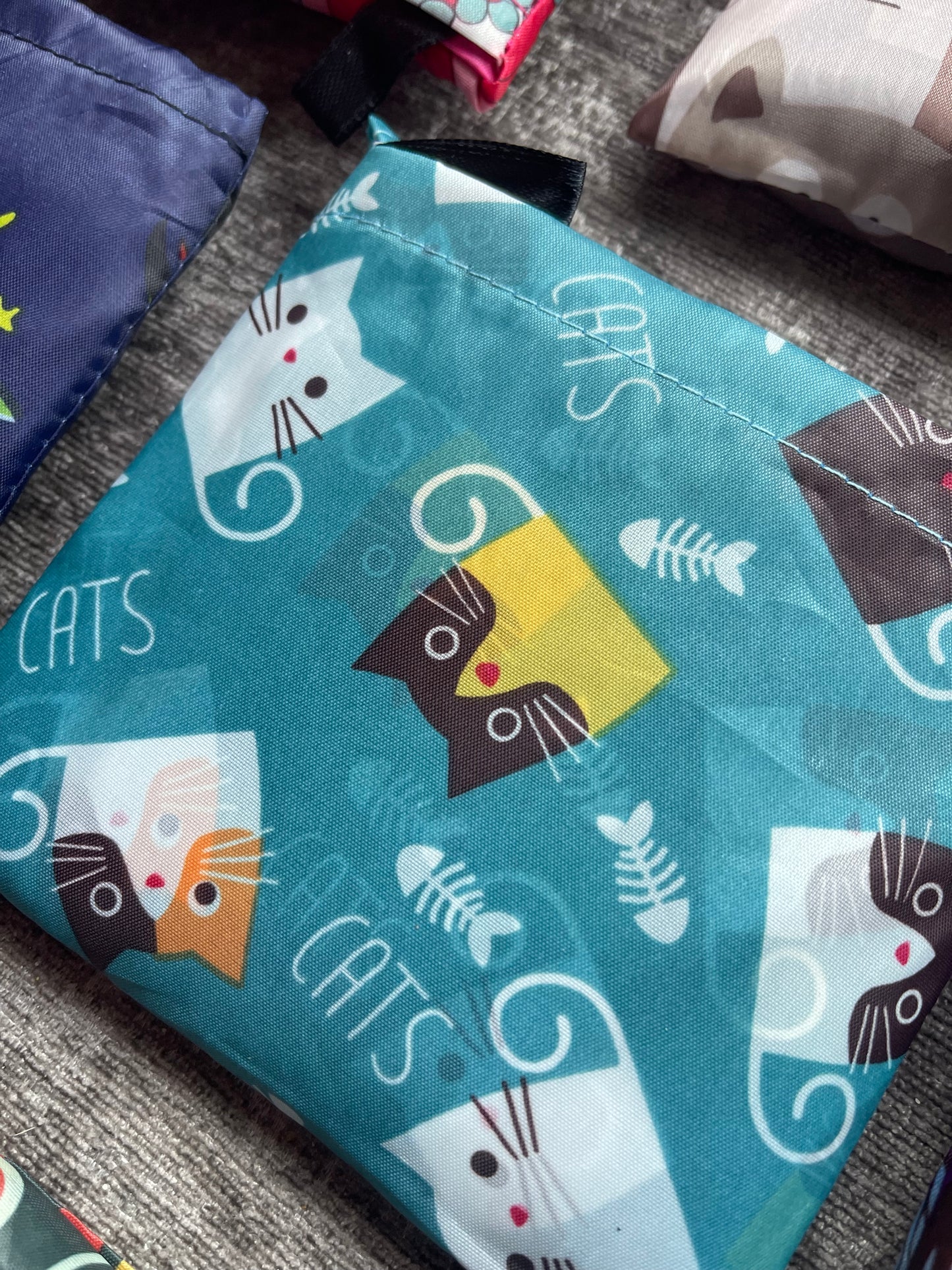 Reusable folding shopping bags