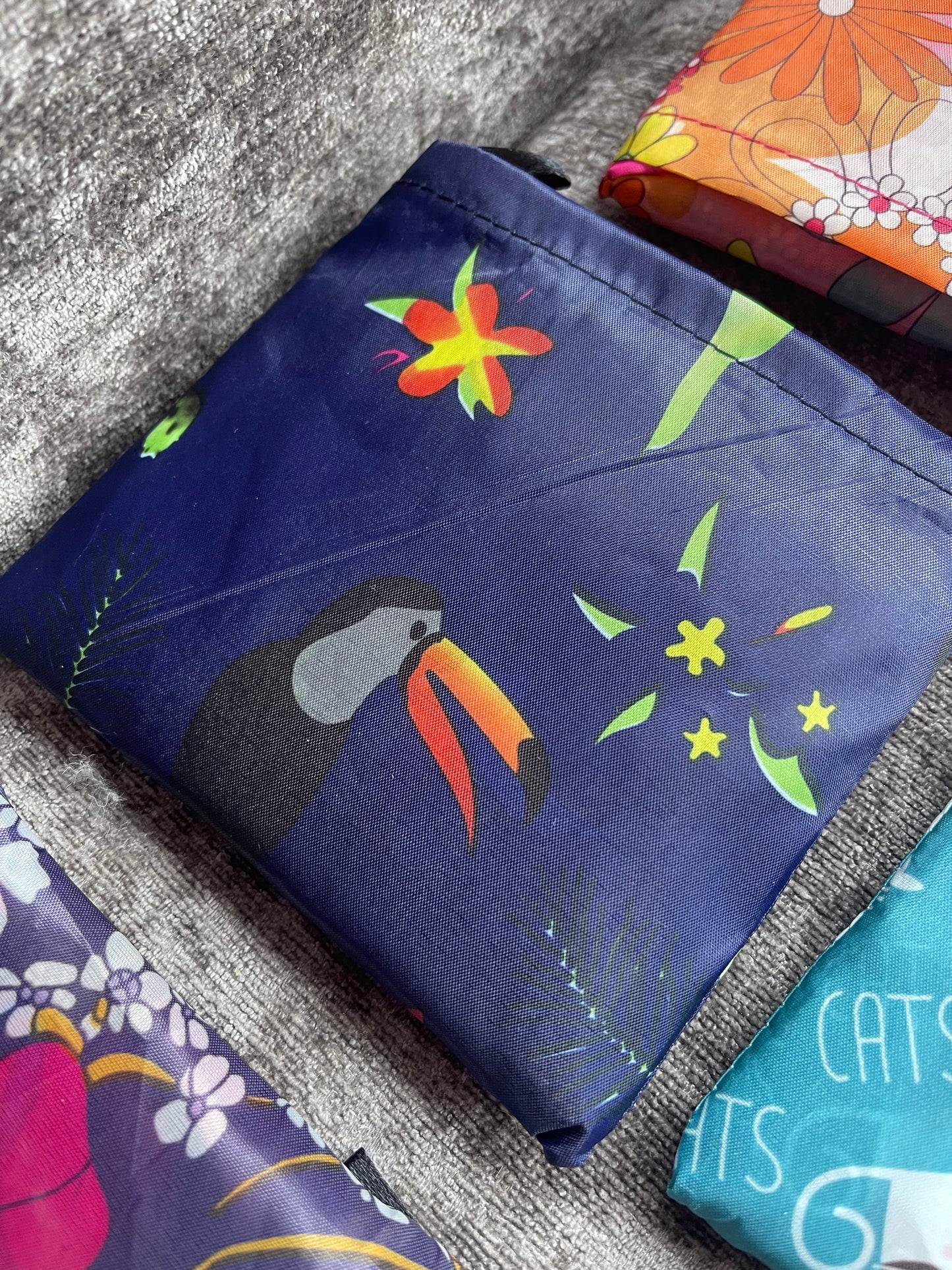 Reusable folding shopping bags